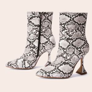 Snake skin midi boots